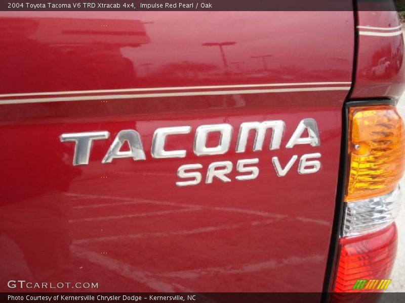 Impulse Red Pearl / Oak 2004 Toyota Tacoma V6 TRD Xtracab 4x4