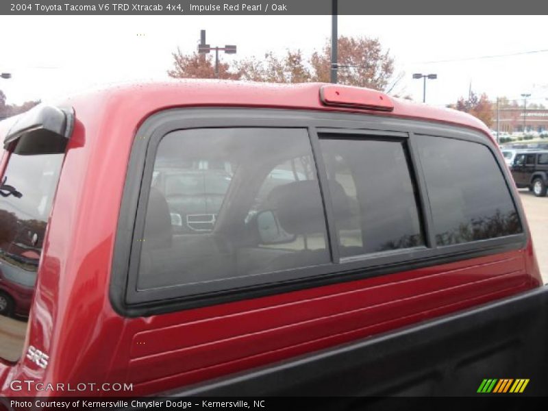 Impulse Red Pearl / Oak 2004 Toyota Tacoma V6 TRD Xtracab 4x4