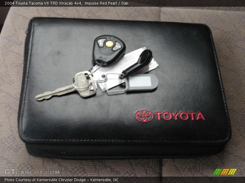 Impulse Red Pearl / Oak 2004 Toyota Tacoma V6 TRD Xtracab 4x4