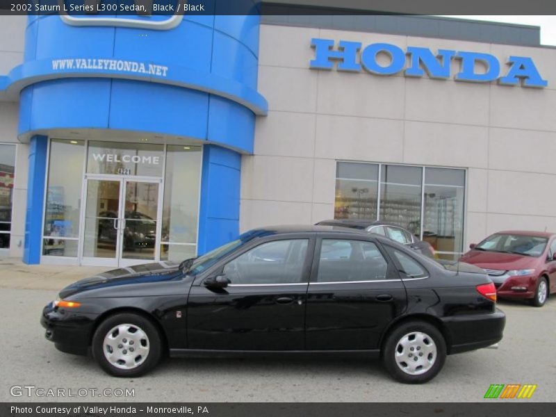 Black / Black 2002 Saturn L Series L300 Sedan