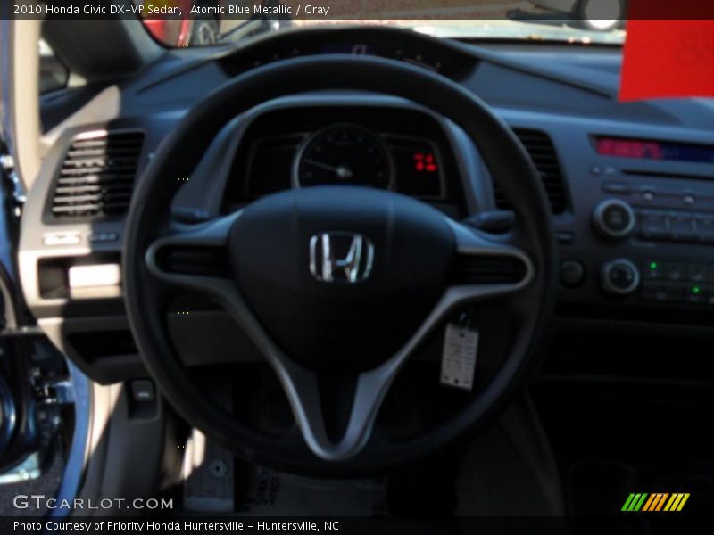 Atomic Blue Metallic / Gray 2010 Honda Civic DX-VP Sedan