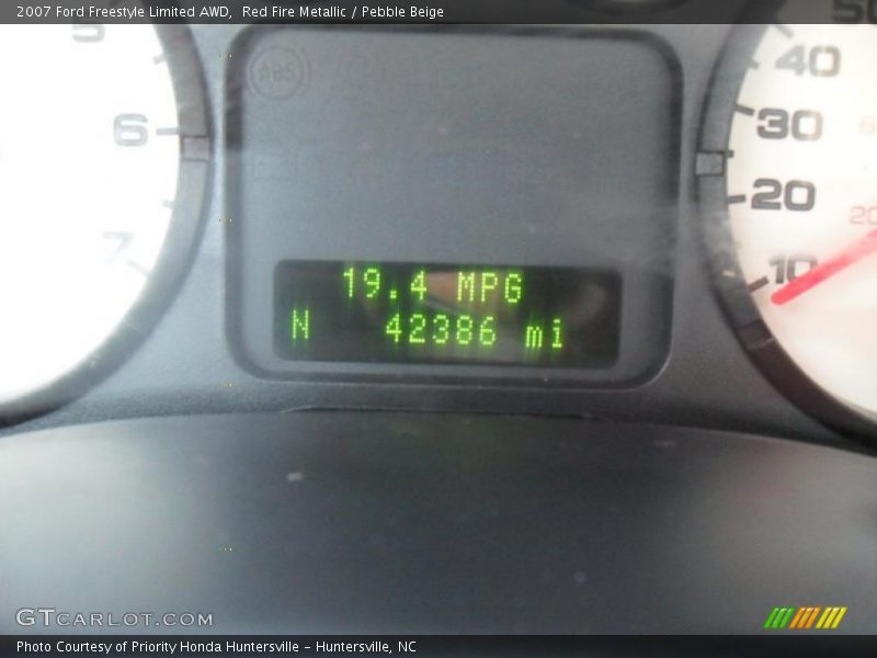 Red Fire Metallic / Pebble Beige 2007 Ford Freestyle Limited AWD