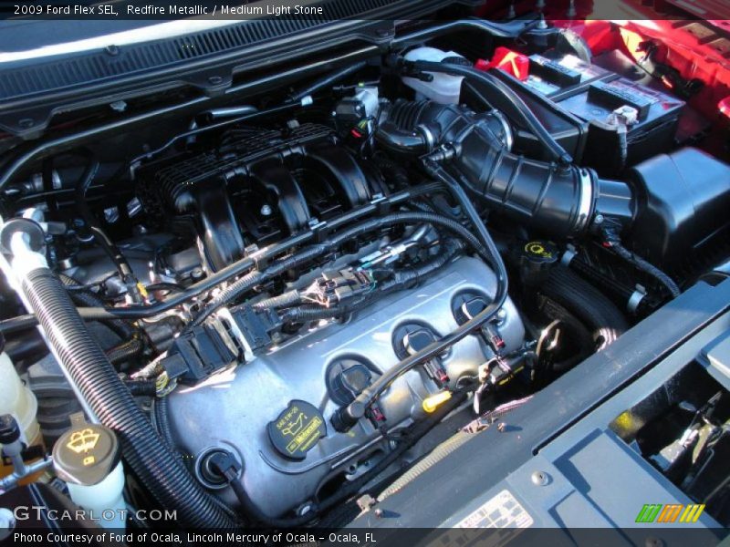Redfire Metallic / Medium Light Stone 2009 Ford Flex SEL