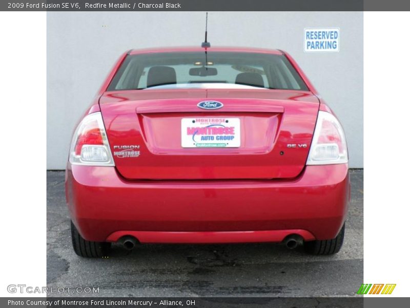 Redfire Metallic / Charcoal Black 2009 Ford Fusion SE V6