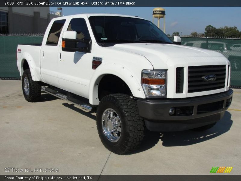 Front 3/4 View of 2009 F250 Super Duty FX4 Crew Cab 4x4