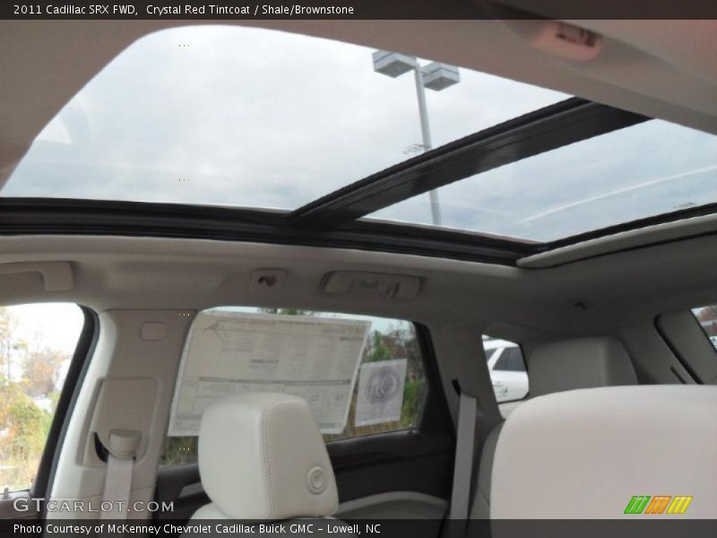 Crystal Red Tintcoat / Shale/Brownstone 2011 Cadillac SRX FWD