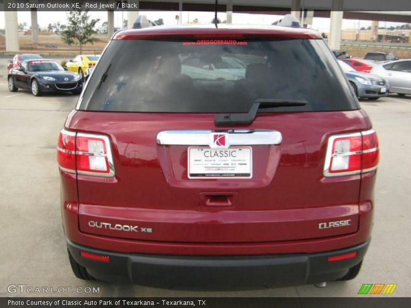Red Jewel / Black 2010 Saturn Outlook XE