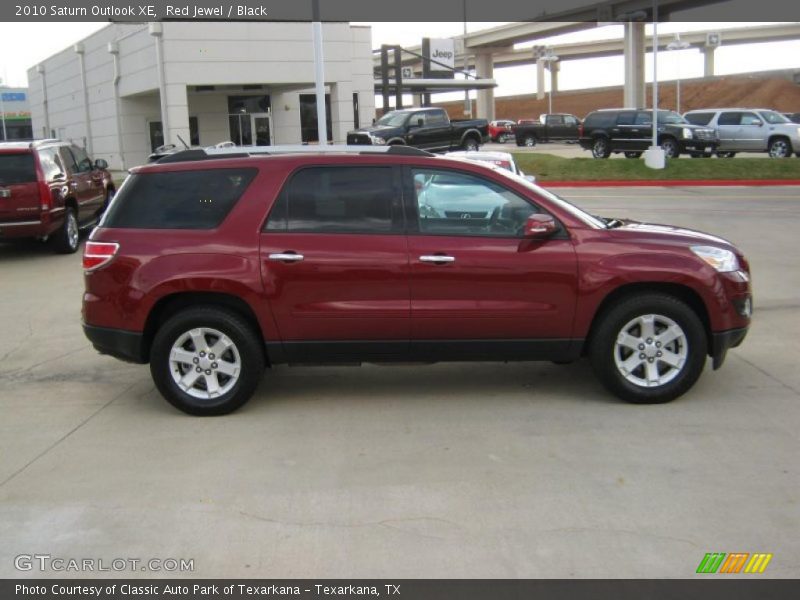 Red Jewel / Black 2010 Saturn Outlook XE