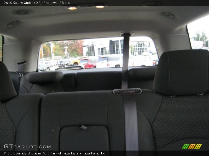 Red Jewel / Black 2010 Saturn Outlook XE