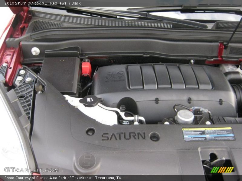 Red Jewel / Black 2010 Saturn Outlook XE