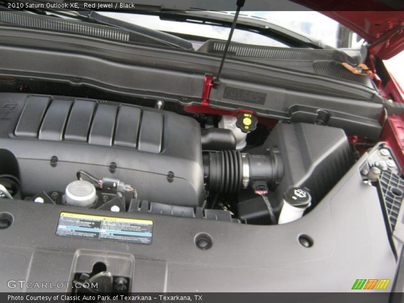 Red Jewel / Black 2010 Saturn Outlook XE
