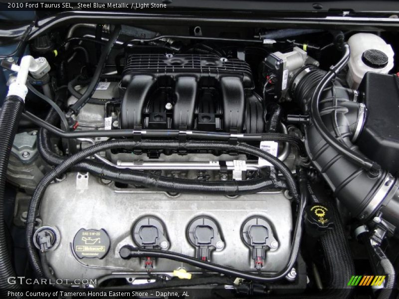 Steel Blue Metallic / Light Stone 2010 Ford Taurus SEL