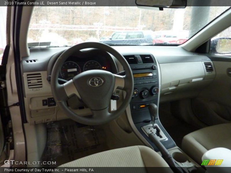 Desert Sand Metallic / Bisque 2010 Toyota Corolla LE