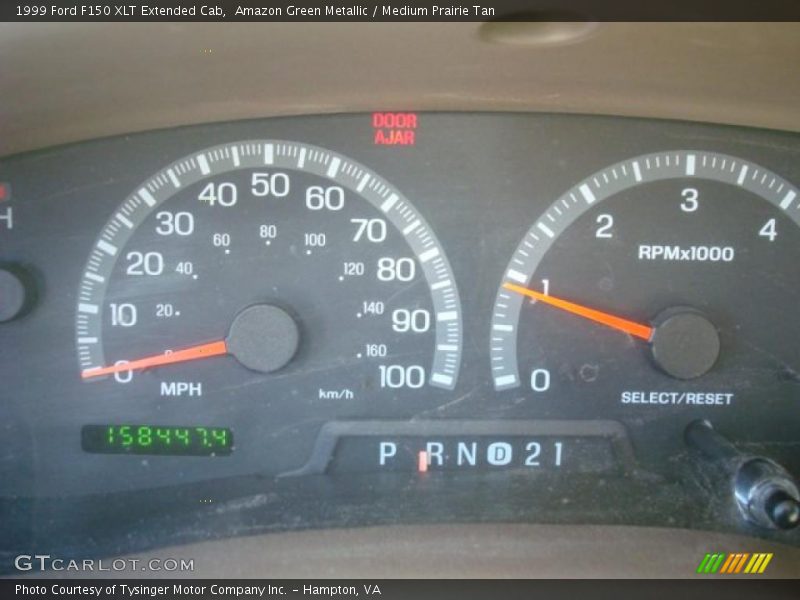 Amazon Green Metallic / Medium Prairie Tan 1999 Ford F150 XLT Extended Cab