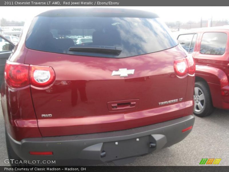 Red Jewel Metallic / Ebony/Ebony 2011 Chevrolet Traverse LT AWD