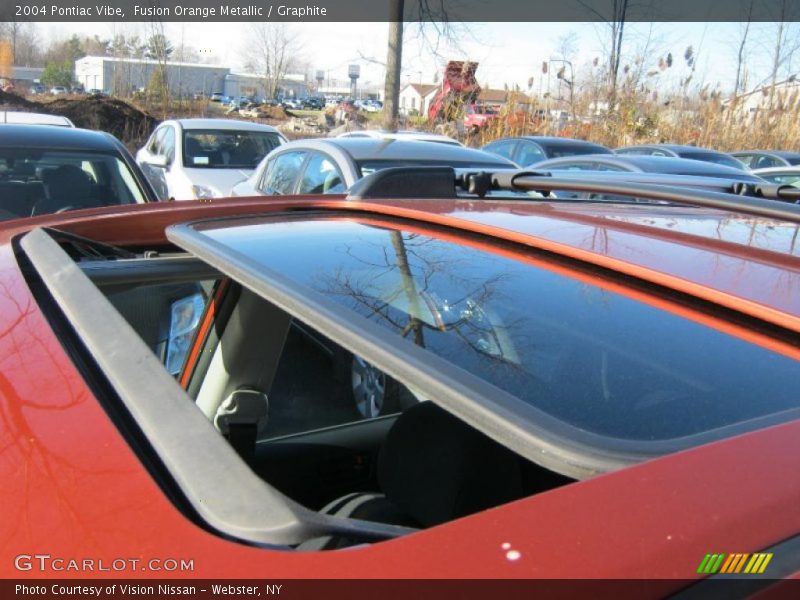 Fusion Orange Metallic / Graphite 2004 Pontiac Vibe
