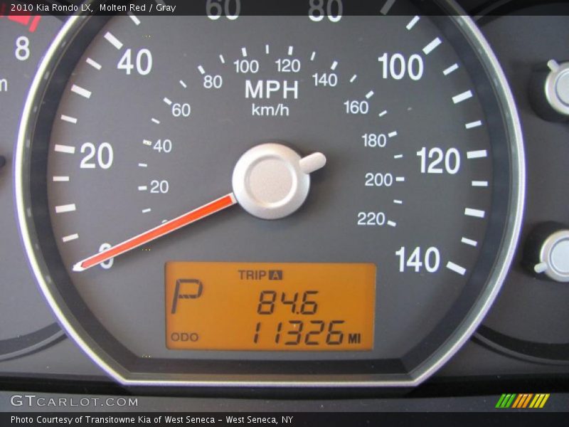 Molten Red / Gray 2010 Kia Rondo LX