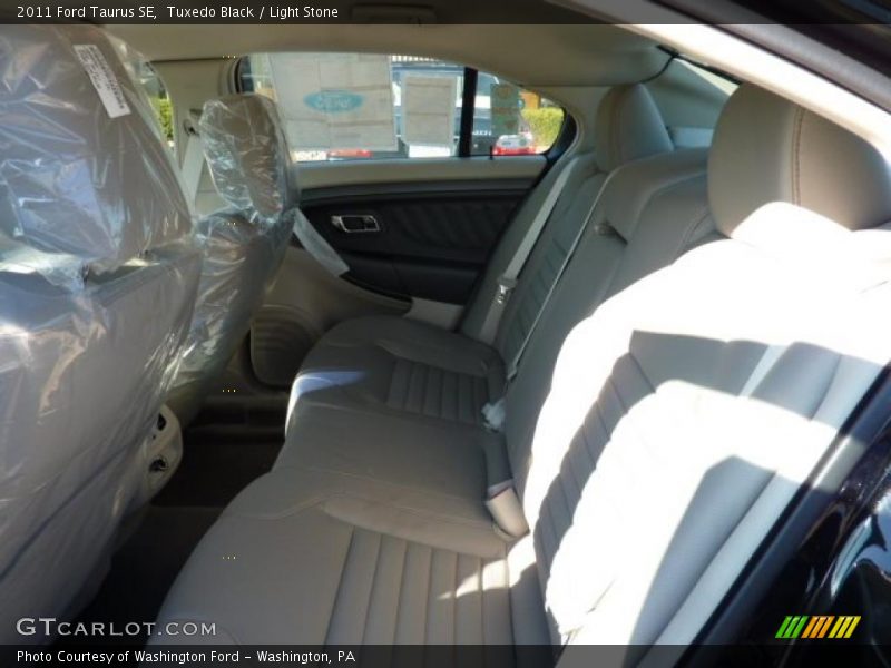 Tuxedo Black / Light Stone 2011 Ford Taurus SE