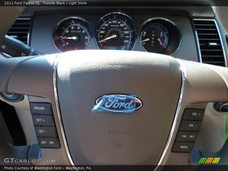 Tuxedo Black / Light Stone 2011 Ford Taurus SE