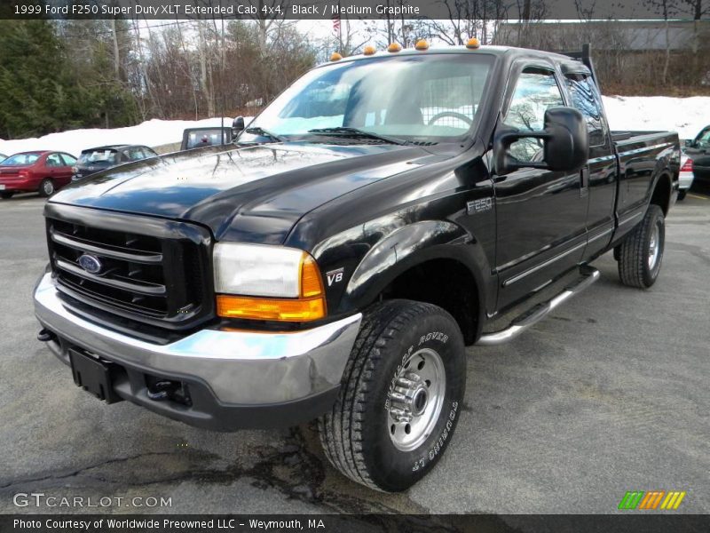 Front 3/4 View of 1999 F250 Super Duty XLT Extended Cab 4x4