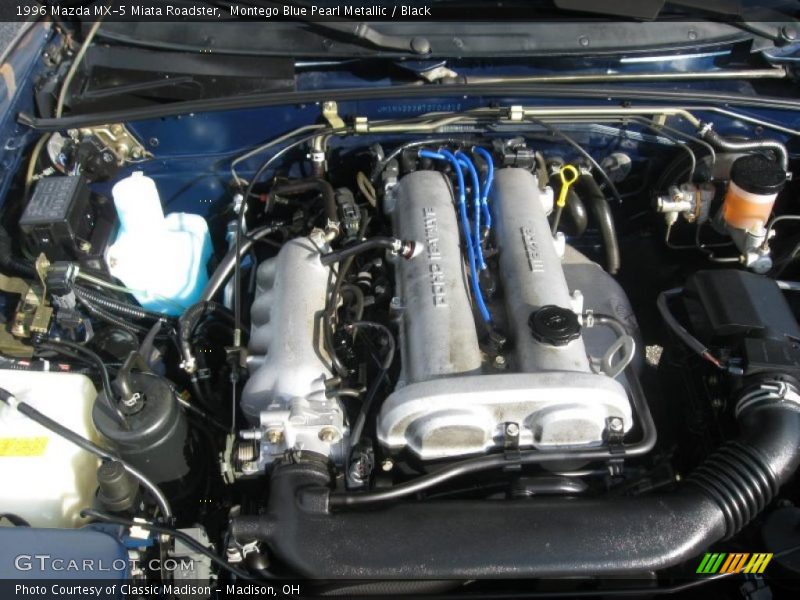 Montego Blue Pearl Metallic / Black 1996 Mazda MX-5 Miata Roadster