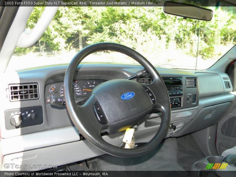 Toreador Red Metallic / Medium Flint 2003 Ford F350 Super Duty XLT SuperCab 4x4