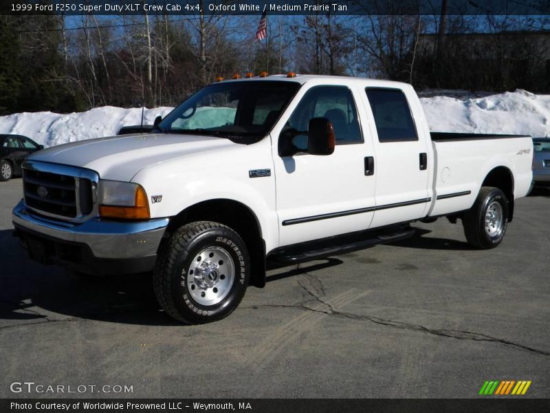 Front 3/4 View of 1999 F250 Super Duty XLT Crew Cab 4x4