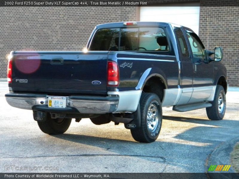 True Blue Metallic / Medium Flint 2002 Ford F250 Super Duty XLT SuperCab 4x4