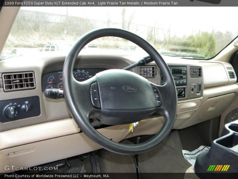 Light Prairie Tan Metallic / Medium Prairie Tan 1999 Ford F250 Super Duty XLT Extended Cab 4x4