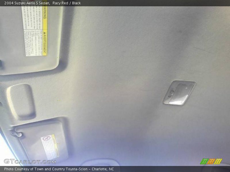 Racy Red / Black 2004 Suzuki Aerio S Sedan