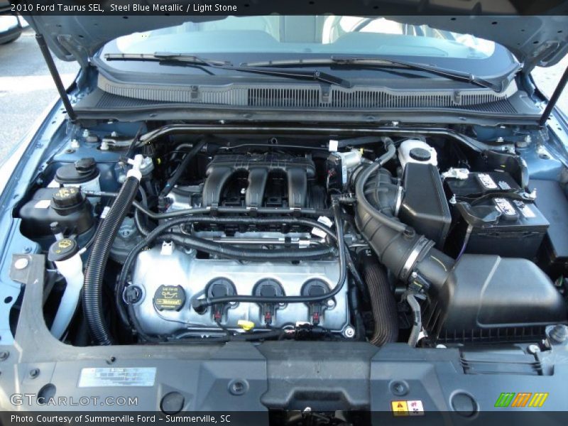 Steel Blue Metallic / Light Stone 2010 Ford Taurus SEL
