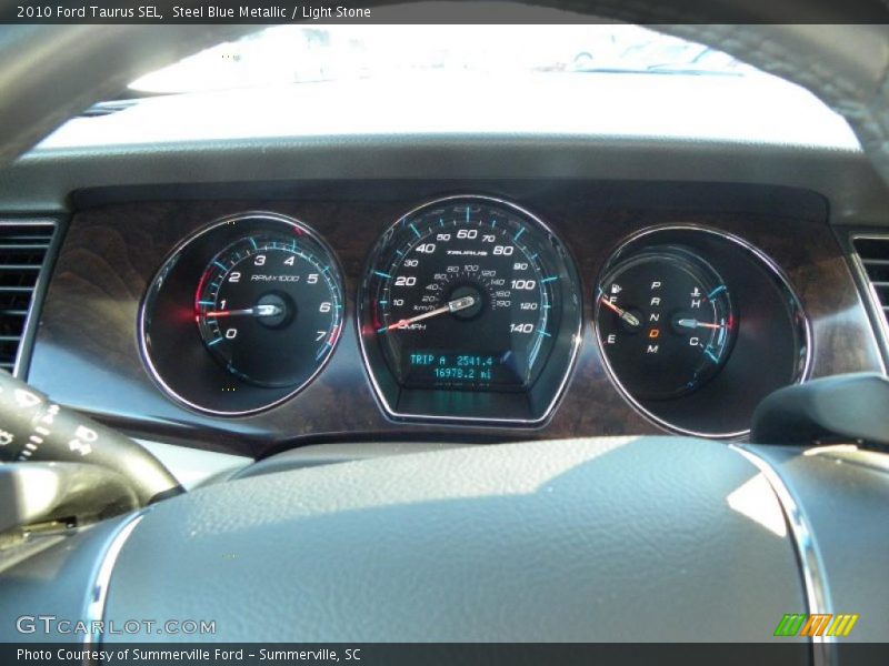 Steel Blue Metallic / Light Stone 2010 Ford Taurus SEL