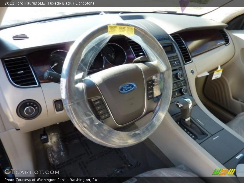 Tuxedo Black / Light Stone 2011 Ford Taurus SEL