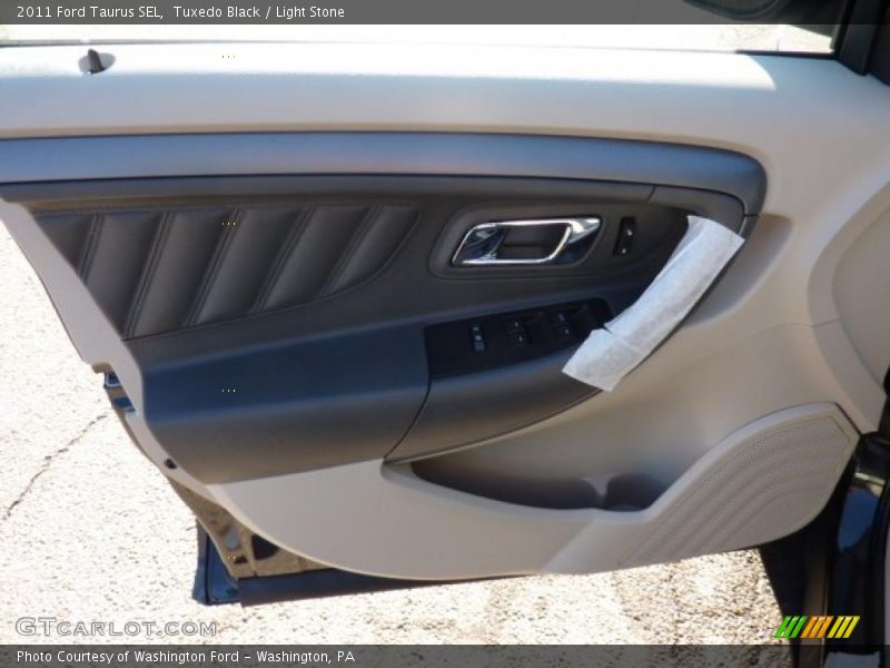 Tuxedo Black / Light Stone 2011 Ford Taurus SEL