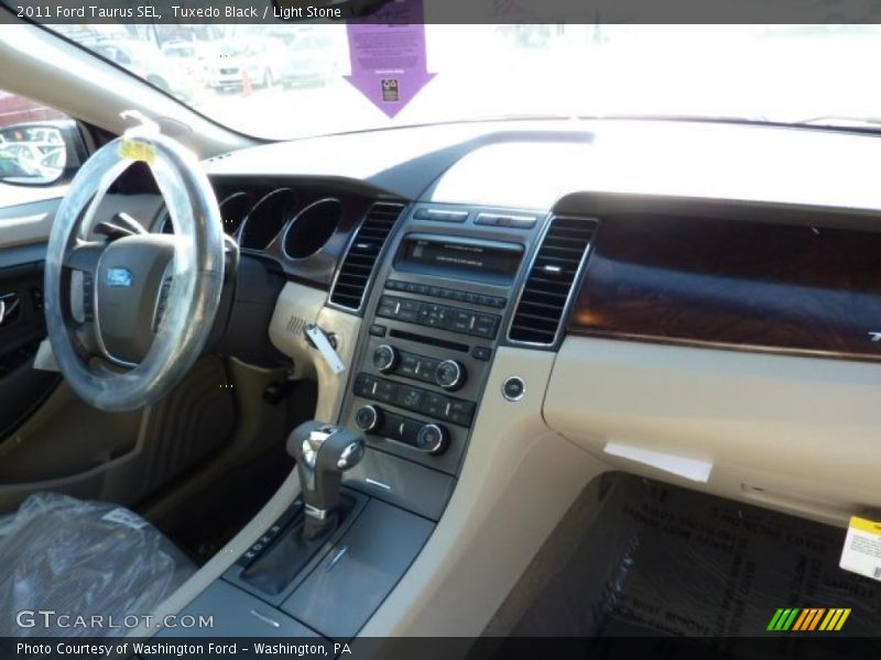 Tuxedo Black / Light Stone 2011 Ford Taurus SEL