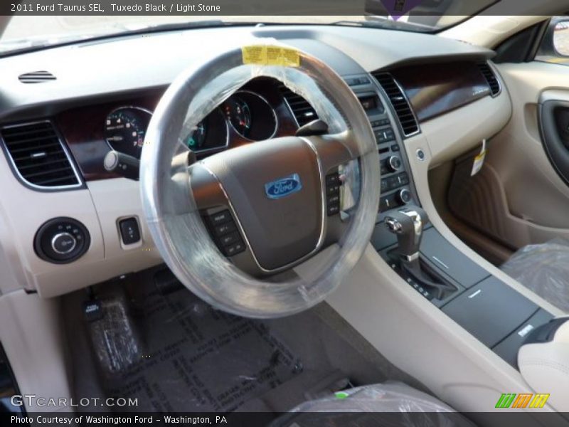 Tuxedo Black / Light Stone 2011 Ford Taurus SEL