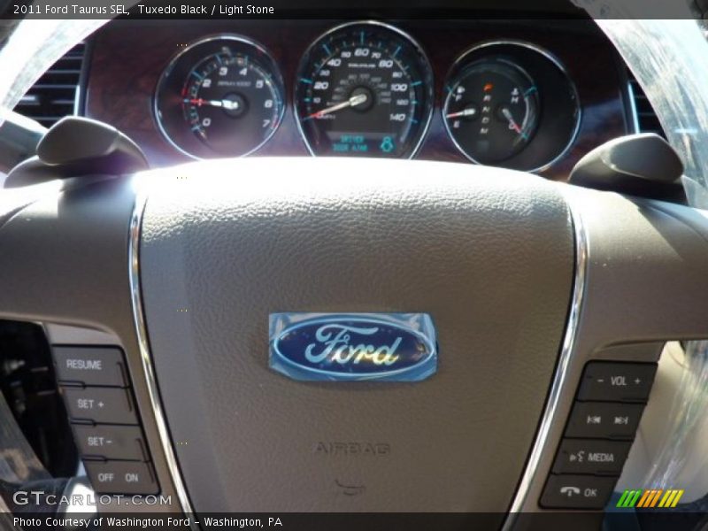 Tuxedo Black / Light Stone 2011 Ford Taurus SEL