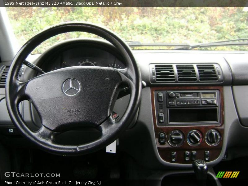 Black Opal Metallic / Grey 1999 Mercedes-Benz ML 320 4Matic