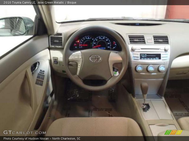 Aloe Green Metallic / Bisque 2010 Toyota Camry LE