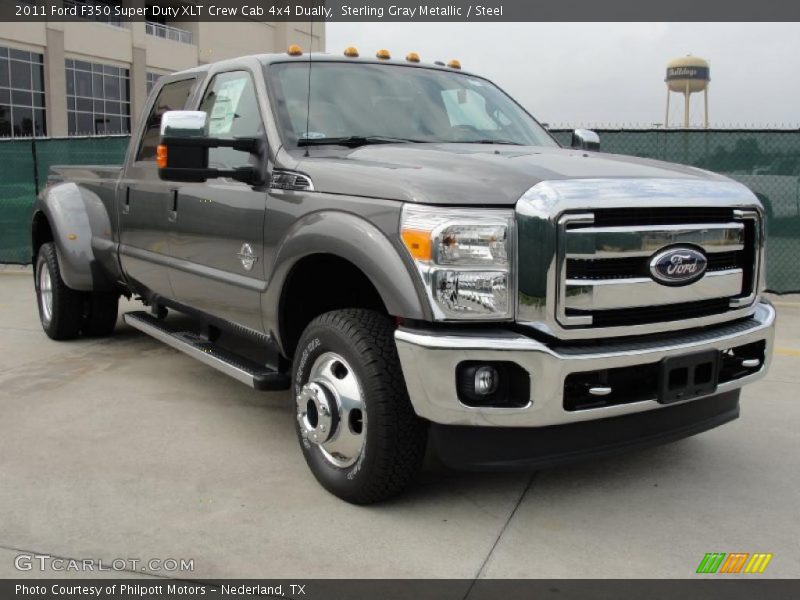 Front 3/4 View of 2011 F350 Super Duty XLT Crew Cab 4x4 Dually
