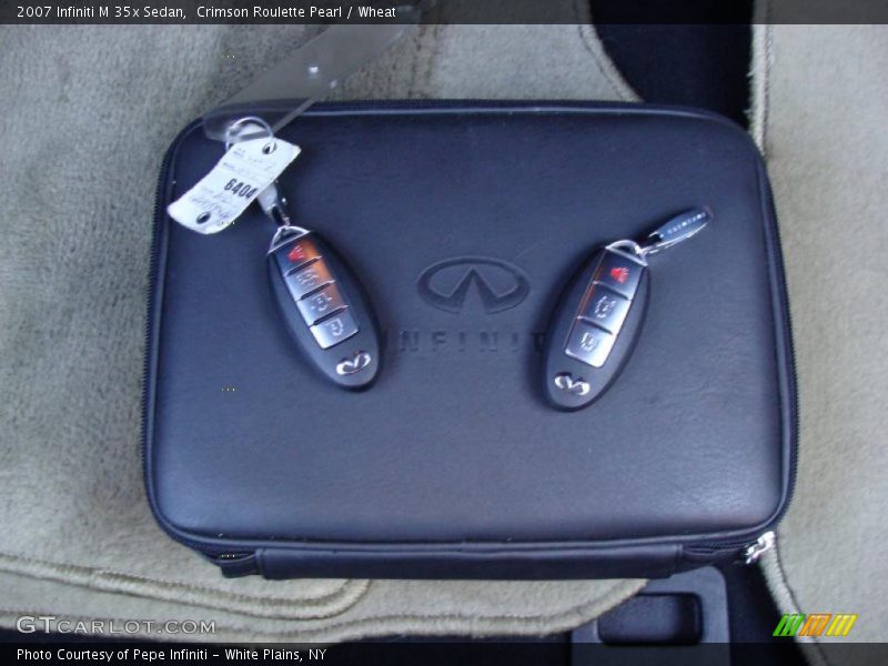 Crimson Roulette Pearl / Wheat 2007 Infiniti M 35x Sedan