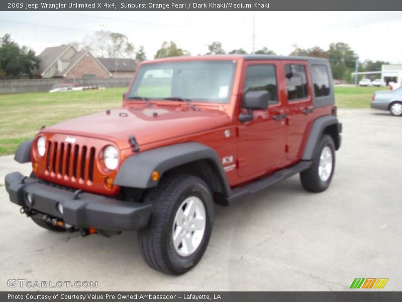 Sunburst Orange Pearl / Dark Khaki/Medium Khaki 2009 Jeep Wrangler Unlimited X 4x4