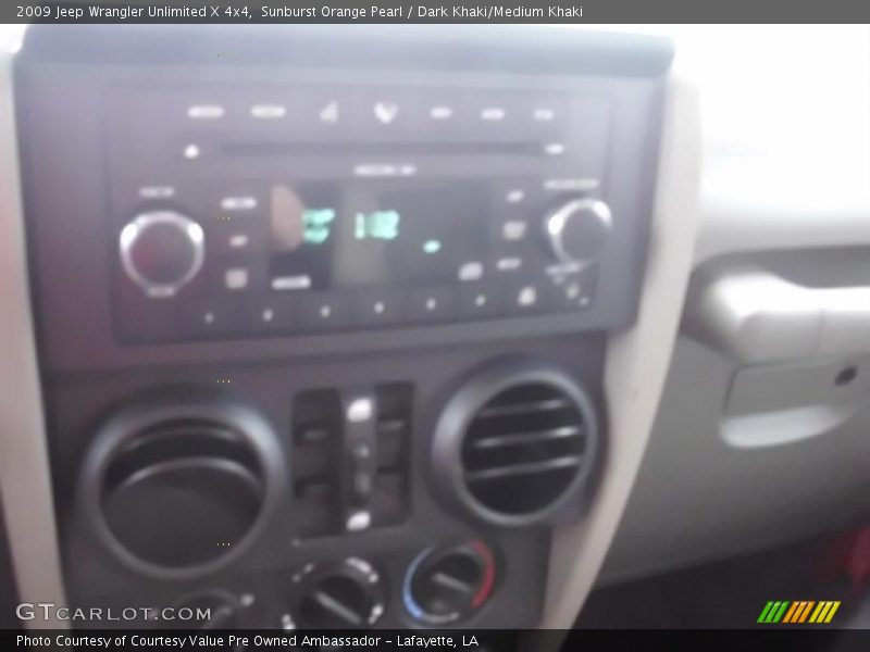 Sunburst Orange Pearl / Dark Khaki/Medium Khaki 2009 Jeep Wrangler Unlimited X 4x4