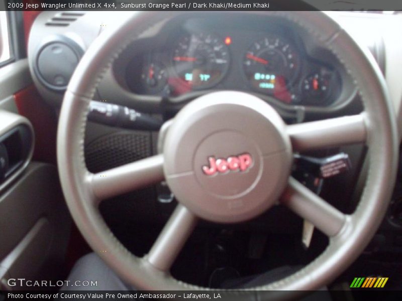 Sunburst Orange Pearl / Dark Khaki/Medium Khaki 2009 Jeep Wrangler Unlimited X 4x4