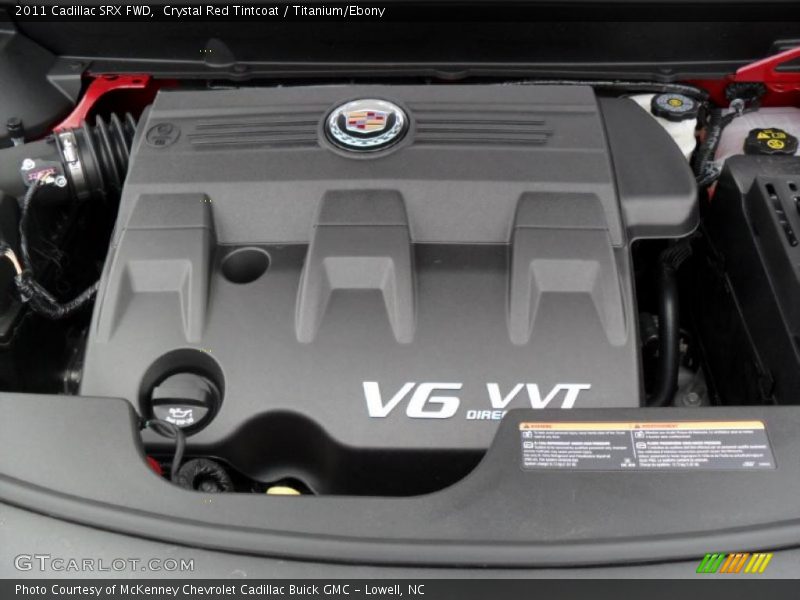 Crystal Red Tintcoat / Titanium/Ebony 2011 Cadillac SRX FWD