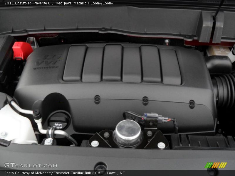 Red Jewel Metallic / Ebony/Ebony 2011 Chevrolet Traverse LT