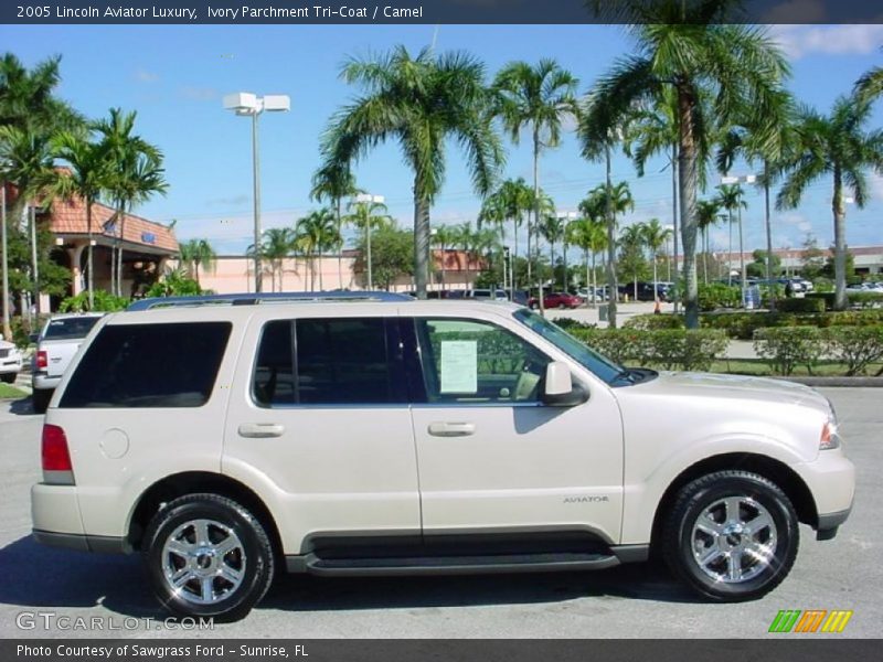  2005 Aviator Luxury Ivory Parchment Tri-Coat