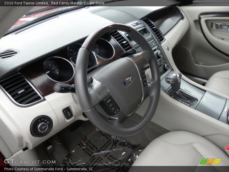 Red Candy Metallic / Light Stone 2010 Ford Taurus Limited