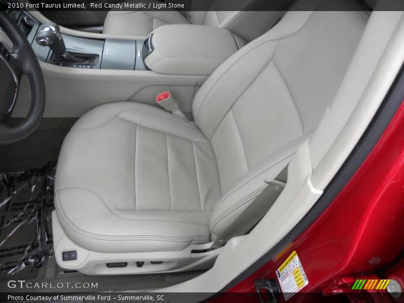 Red Candy Metallic / Light Stone 2010 Ford Taurus Limited