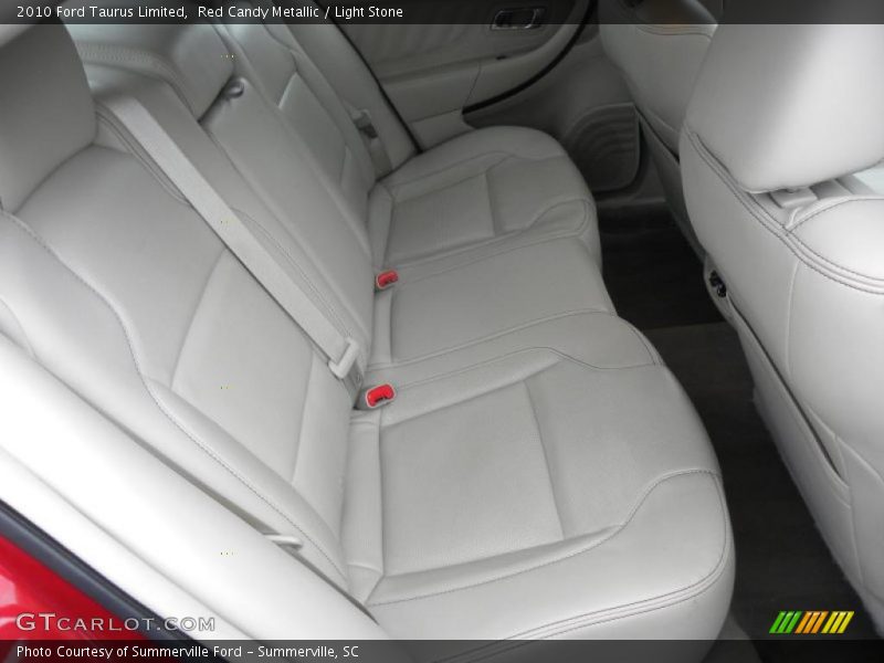Red Candy Metallic / Light Stone 2010 Ford Taurus Limited